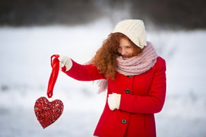 graphicstock-lonely-girl-in-the-red-coat-is-holding-heart-and-waiting_rRexUn9-Z_thumb.jpg