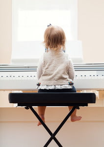 graphicstock-happy-toddler-girl-playing-the-piano-from-behind_HPxXFUhVub_thumb.jpg