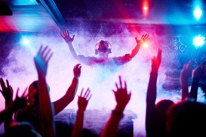 graphicstock-male-deejay-in-headphones-and-sunglasses-looking-at-dancing-crowd_r1p5mycRQb_thumb-1.jpg