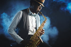 storyblocks-portrait-of-a-jazzman-playing-a-saxophone_BpbgEVpX-G_thumb.jpg