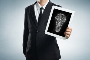 graphicstock-successful-young-businessman-shows-the-screen-of-the-tablet-with-bright-idea_HuagqPsPgse_thumb.jpg