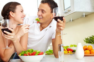 graphicstock-young-happy-couple-eating-vegetable-salad-and-drinking-red-wine_BC7g7JsF-W_thumb.jpg