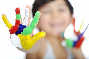 little-boy-with-hands-painted-in-colorful-paints-ready-for-hand-prints_rKZ4210Ho_thumb.jpg